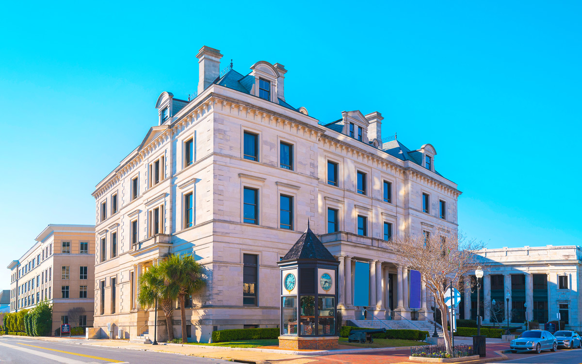 city-building Cars parked infront of city building in Pensacola, FL