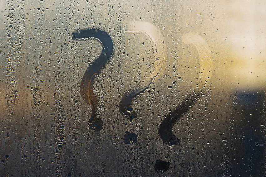 high-humidity A question mark drawn on a rain-drenched window in Pensacola, FL